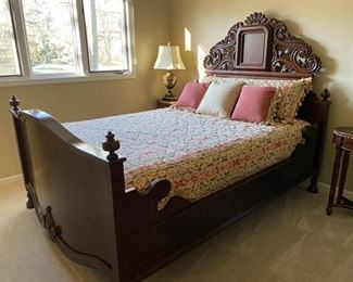 Plantation-style carved queen bed