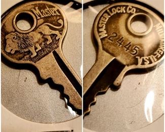 Antique Master Lock Co key circa 1920s. Walking Lion. Rare Silver/nickel. Milwaukee - USA