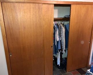 This closet is stuffed full of vintage clothing : )