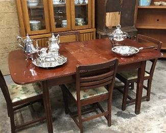 Antique dining table with four chairs 