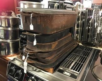 Cast iron griddles, ham boiler, fish fryers