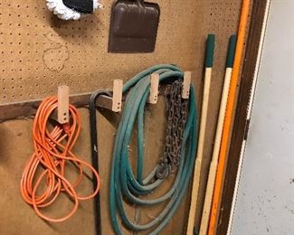 Extension cord, dust pan, gardening tools, hose