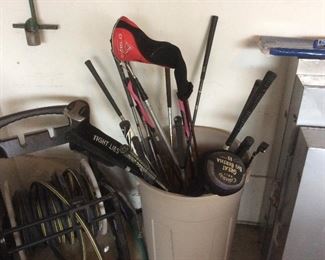 Trash can of golfclubs
