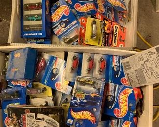 Hundreds of new in box Hot Wheels cars from the 1980s and 1990s plus hundreds more that were used as toys.