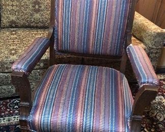Antique Eastlake armchair on casters (nicely re-upholstered)