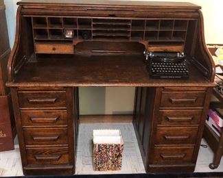 Antique oak roll top desk (54”L, 47”H, 30”D)