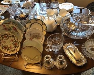 Limoges & hand painted plates, sterling candlesticks, silver plate butter dish, crystal pitcher & punch bowl