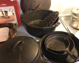Cast iron cookware:  Griswold #10 Dutch oven (835B) with Tite-Top lid & #208 trivet, unmarked hammered chicken fryer w/ lid, skillets: Griswold #3 (709M), Wagner #5 (1055E), Griswold #10 (716C) w/ large logo & heat ring
