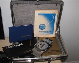 Pilot log / manuals, computer and more.