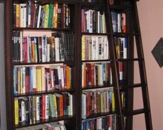 Office / Library wall full of books.