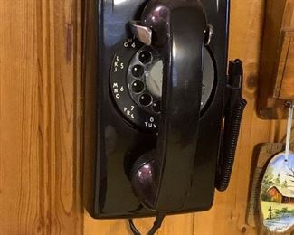 Black rotary telephone