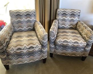 Modern pair of arm chairs. 