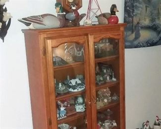 curio cabinet , ducks, roosters, clocks , cottages and more decor