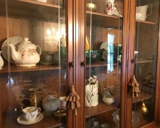 hutch filled with collectibles