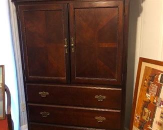 This is NOT an entertainment center! It is a "dining room hutch," or perhaps a "bedroom wardrobe," according the Cher.