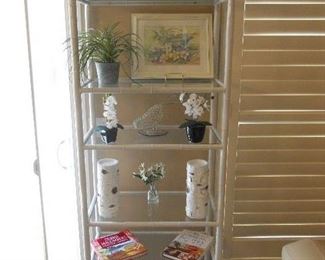 Kitchen:  A white metal bamboo-look etagere has six removable glass shelves.  It measures 26" wide x 14" deep x 78" tall.  The accessories shown are also for sale.