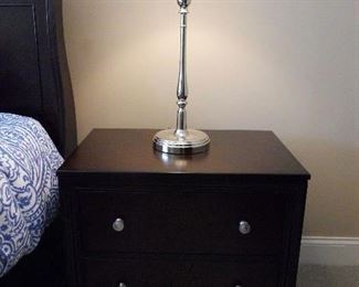 Master Bedroom-Main Floor: One of two 2-drawer nightstands (BRYANT PARK collection from Macy's) is shown with one of two silver RALPH LAUREN lamps.  The nightstands and the lamps are priced in pairs.