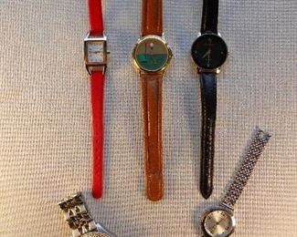 "Smalls" Area-In a Case:  Several fashionable watches--but they do need batteries.  The center golf theme watch is a HELEN HURTIG.