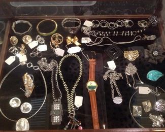 Case:  This is one of three cases which display a variety of items.  This one has jewelry; the next two cases have vintage lead soldiers and collectibles.  Closer photos of some of the case items are coming up soon.