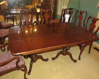 EXCEPTIONAL DINING ROOM TABLE WITH 8 CHAIRS AND 2 LEAVES NOT SHOWN.