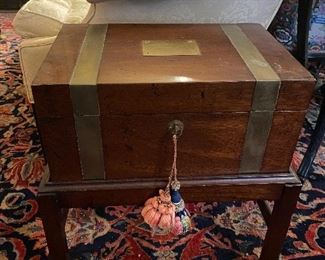 Beautiful Box on stand with brass strap work. 