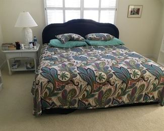 King size bed, Sterns & Foster matress & box spring, bedding, wicker table, two Techline bookcases