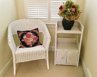 Wicker chair and stand, pottery vase