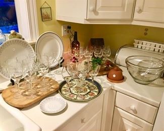 Many sets of wine stems, misc. kitchen items