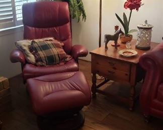 Red leather arm chair and ottoman; pine side table; floor lamp
