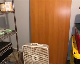 Table (legs have been removed and are on the bottom shelf!) and fan