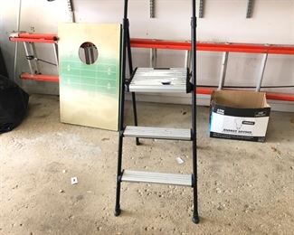 Bags game, extension ladder and step ladder