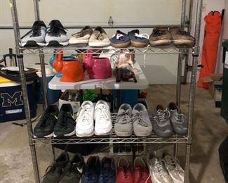 Metal shelving unit and men’s shoes