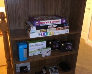 Small bookcase, games and electronics