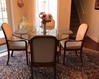 Octagon Solid Wood Fruitwood Kitchen Table and 4 chairs complemented by
a beautiful Karastan Rug 8.8 x 12'