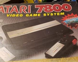 Atari 7800 in box/ works 
4 games