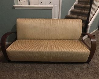 This is a couch from Hong Kong. It is real wood, cherry in color. It is basically new, the fabric just needs to wiped down from travel. It’s in near perfect condition. We are listing this piece at $210. Please contact fowlesales@gmail.com to schedule a viewing for purchase. 