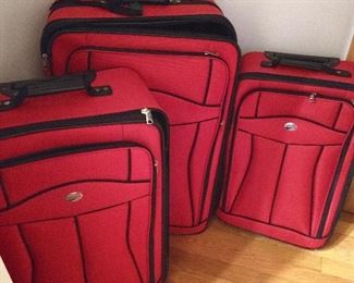 **NEW*** NEVER USED 4-PC  R-E-D  AMERICAN TOURISTER LUGGAGE  ( DUFFLE  BAG INCLUDED/ NOT PICTURED)