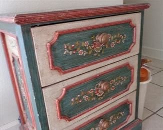 love this small distressed cabinet