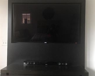 65 inch Samsung Smart television, bring your tools to take it home with you.  The sound bar is available for purchase also.  The Dresser is not for sale as it is attached to the wall. 