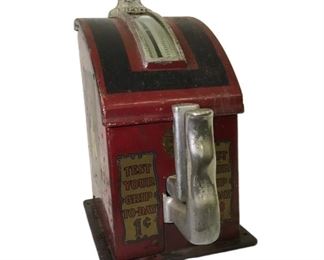1920s Penny Arcade Grip Strength Test Machine made by Gottlieb. It is made of cast iron and steel and features decals on both sides with strongman graphics that read “Are You Strong Or Weak”-“Test Your Grip”