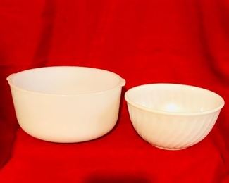 Left milk glass mixing bowl and right Pyrex bowl