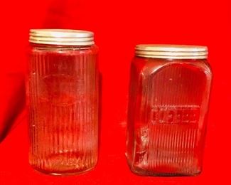 Vintage glass coffee jars with aluminum lids.