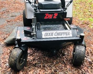 Less than 2 years old! Dixie Copper Zee 2 54 inch cut mower with 135 hours.