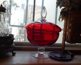Red glass compote with lid.