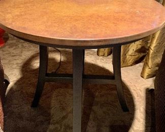 Crate and Barrel metal base copper top round table