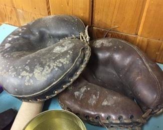 Two vintage catchers gloves