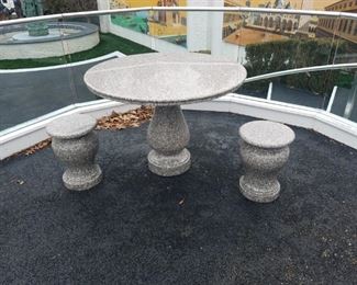 Smaller granite table with two stools 