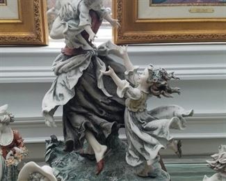 Several Florence Giusseppe Armani porcelain figurines 