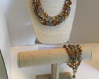 Marbella signed set of four glass rhinestones pieces. Brown & grey