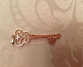 14kt rose gold key pendant
